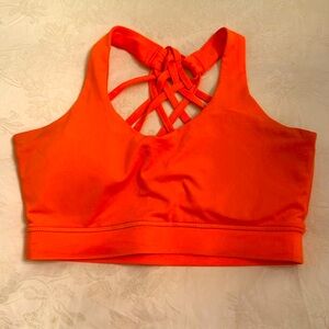 Neon orange sports bra